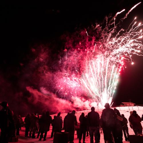 People watching fireworks at Winter Wonderland Park