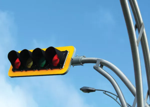traffic light against a blue sky