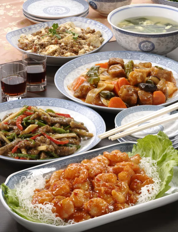 Various plates of Chinese food