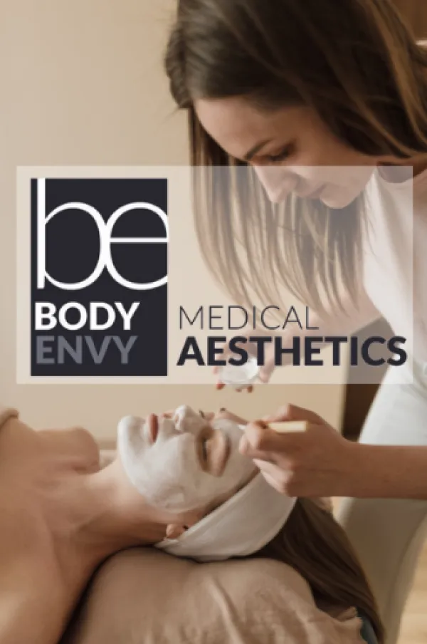 Person receiving facial and company logo