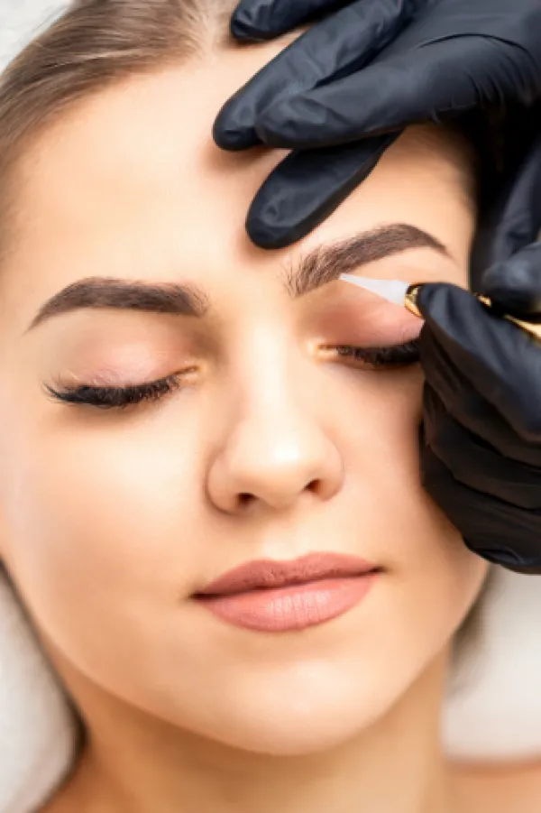 Permanant eyebrow makeup being Applied