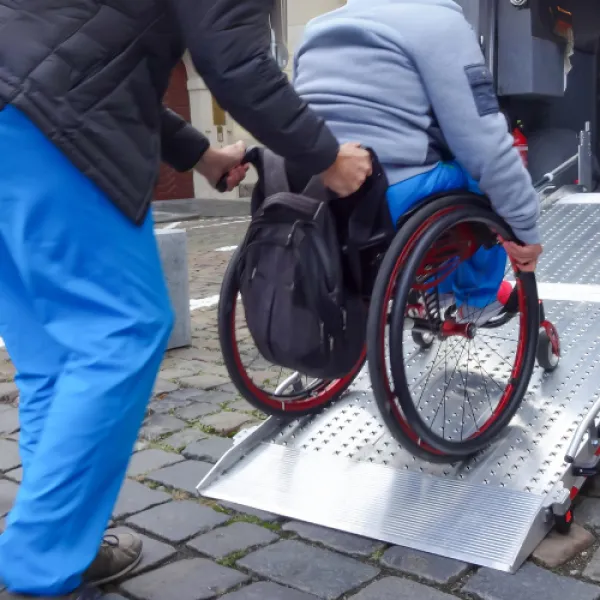 Wheelchair Being Pushed into Mobility Van
