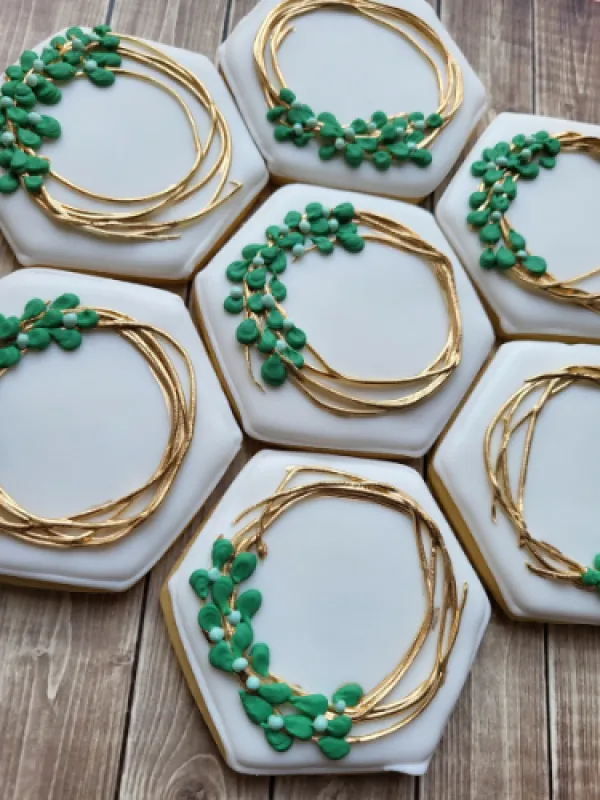 Elegantly decorated cookies created by The Cookie Lady