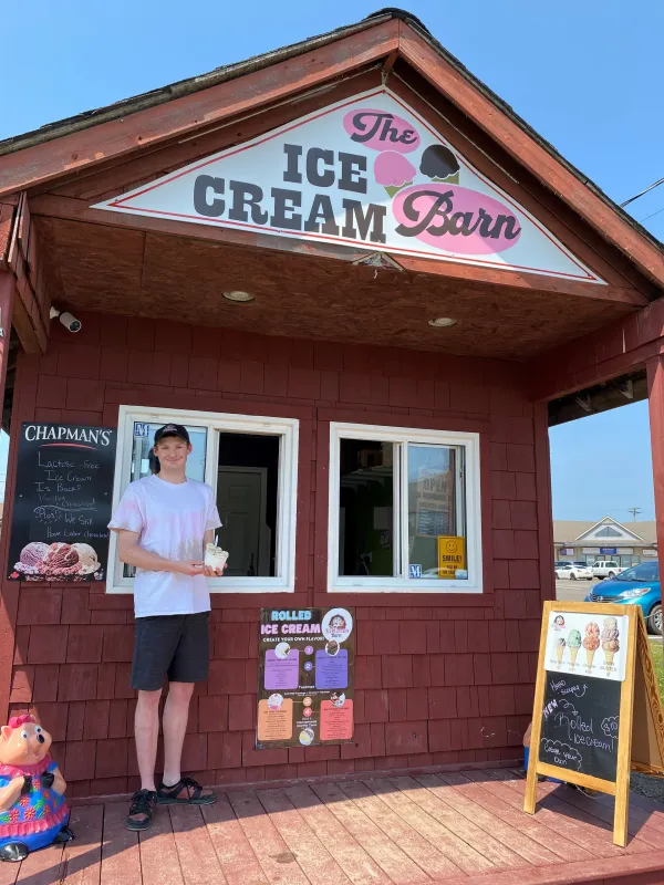 exterior of the ice cream barn and the owner.