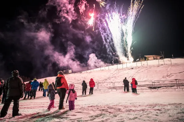 People watching fireworks at Winter Wonderland Park during Ignite.