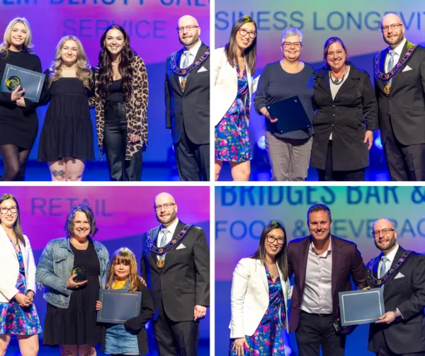 A collage of four photographs of business owners with Town staff at an awards gala.