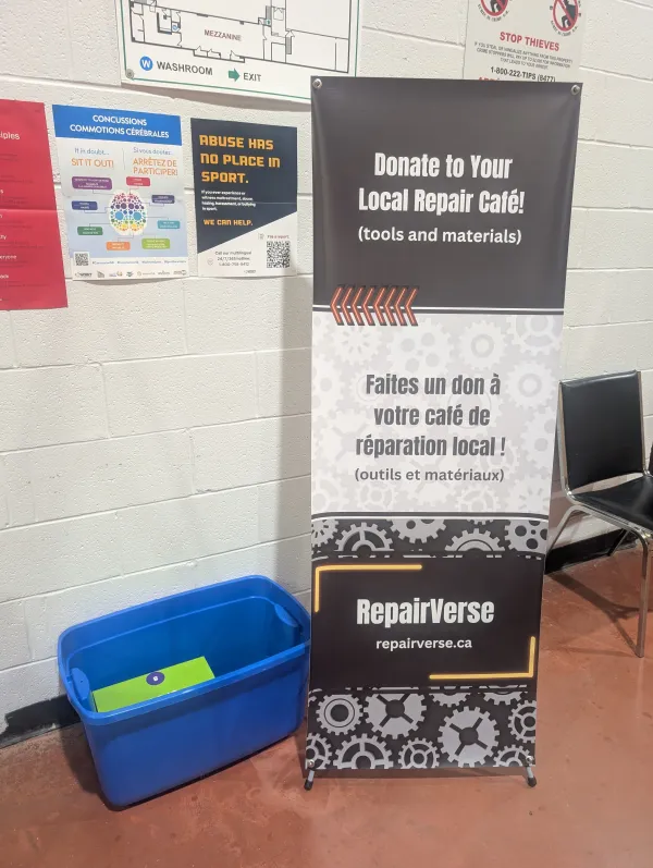 A bin with a sign asking for donations